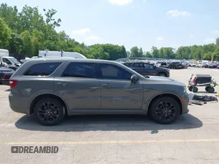 2021 Dodge Durango R/T with VIN 1C4SDJCT3MC642998, listed as a IAAI auction lot 42517922 with 50,467 mi miles and . Bid and sale history available at DreamBid. Image 14.