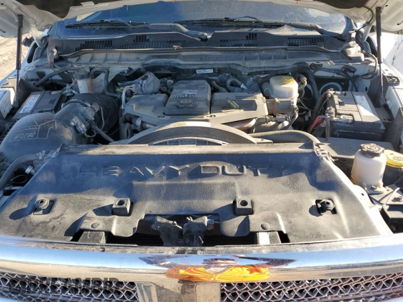 2015 Ram 2500 Tradesman z VIN 3C6UR5CL6FG503506, wystawiony jako Copart lot #46461565 z przebiegiem 236 529 mil mil oraz Czysty tytuł • Clean title. Historia ofert i sprzedaży dostępna na DreamBid. Obrazek 12.