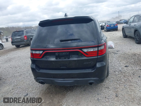 2021 Dodge Durango SRT Hellcat with VIN 1C4SDJH91MC682235, listed as a IAAI auction lot 42029380 with 9,921 mi miles and . Bid and sale history available at DreamBid. Image 16.