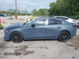2024 Mazda 3 S Carbon Edition with VIN 3MZBPBCM2RM403824, listed as a IAAI auction lot 42612315 with 8,261 mi miles and . Bid and sale history available at DreamBid. Image 15.