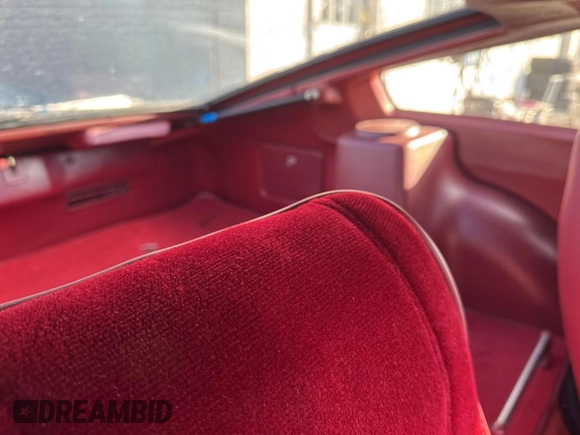 1980 Datsun 280ZX z VIN HS130198111, wystawiony jako Copart lot #84153084 z przebiegiem 106 400 mil mil oraz Tytuł czysty. Historia ofert i sprzedaży dostępna na DreamBid. Obrazek 6.