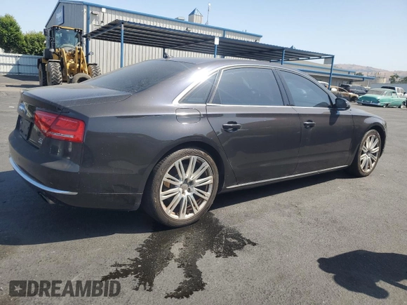2011 Audi A8 z VIN WAURVAFD0BN005579, wystawiony jako Copart lot #59584025 z przebiegiem 95 704 mil mil oraz Szkoda całkowita • Salvage title. Historia ofert i sprzedaży dostępna na DreamBid. Obrazek 3.