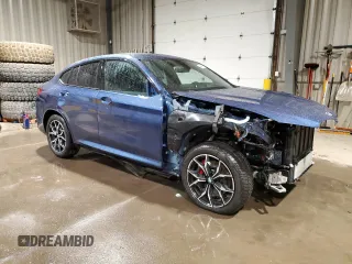 2024 BMW X4 M40i with VIN 5UX43DT04R9U24736, listed as a Copart auction lot 48940615 with 23,363 mi miles and Salvage Title. Bid and sale history available at carsss.com. Image 4.