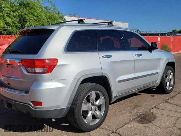 2011 Jeep Grand Cherokee Overland with VIN 1J4RR6GG7BC745066, listed as a Copart auction lot 66415905 with 164,264 mi miles and Clean title. Bid and sale history available at DreamBid. Image 4.