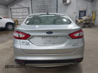 2014 Ford Fusion SE with VIN 3FA6P0H92ER284852, listed as a IAAI auction lot 42104842 with 103,295 mi miles. Bid and sale history available at carsss.com. Image 16.