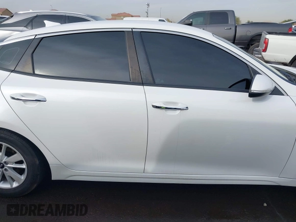 2016 Kia Optima LX with VIN KNAGT4L39G5103589, listed as a IAAI auction lot 41586470 with 104,351 mi miles and . Bid and sale history available at carsss.com. Image 13.
