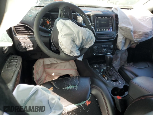 2022 Jeep Cherokee Trailhawk with VIN 1C4PJMBX8ND543366, listed as a Copart auction lot 55805195 with 61,926 mi miles and Salvage title. Bid and sale history available at DreamBid. Image 8.