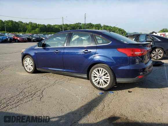 2017 Ford Focus Titanium with VIN 1FADP3J2XHL203959, listed as a Copart auction lot 55498465 with 68,154 mi miles and Salvage title. Bid and sale history available at DreamBid. Image 2.