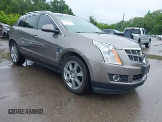2012 Cadillac SRX Premium Collection z VIN 3GYFNCE3XCS620507, wystawiony jako IAAI lot #42348835 z przebiegiem 184 737 mil mil oraz . Historia ofert i sprzedaży dostępna na DreamBid. Obrazek 1.