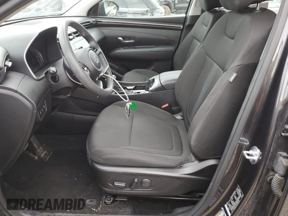 2023 Hyundai Tucson SEL with VIN 5NMJBCAE5PH186784, listed as a Copart auction lot 62896985 with 13,633 mi miles and Salvage title. Bid and sale history available at DreamBid. Image 7.