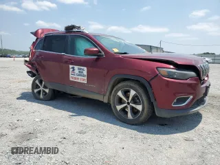 2019 Jeep Cherokee Limited with VIN 1C4PJMDX1KD345303, listed as a Copart auction lot 59298185 with 166,168 mi miles and Salvage title. Bid and sale history available at DreamBid. Image 4.