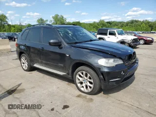 2012 BMW X5 35i with VIN 5UXZV4C59CL752661, listed as a Copart auction lot 58590305 with 101,725 mi miles and Salvage title. Bid and sale history available at DreamBid. Image 4.