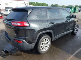 2014 Jeep Cherokee Sport with VIN 1C4PJLAB1EW221415, listed as a IAAI auction lot 42170364 with 182,813 mi miles and . Bid and sale history available at DreamBid. Image 4.