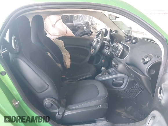 2017 Smart fortwo Pure z VIN WMEFJ9BA8HK231165, wystawiony jako IAAI lot #42238753 z przebiegiem 31 242 mil mil oraz . Historia ofert i sprzedaży dostępna na DreamBid. Obrazek 5.