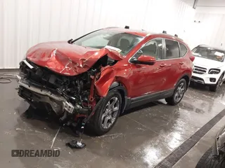 2018 Honda CR-V EX with VIN 2HKRW2H55JH661562, listed as a IAAI auction lot 41925429 with 112,575 mi miles and . Bid and sale history available at DreamBid. Image 2.