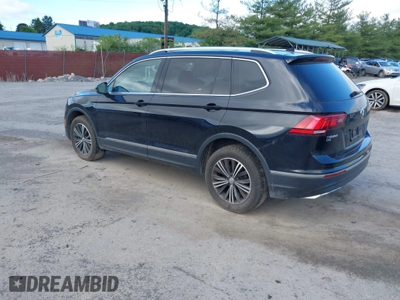 2018 Volkswagen Tiguan SEL z VIN 3VV2B7AXXJM145781, wystawiony jako IAAI lot #42273176 z przebiegiem 86 610 mil mil oraz . Historia ofert i sprzedaży dostępna na DreamBid. Obrazek 3.