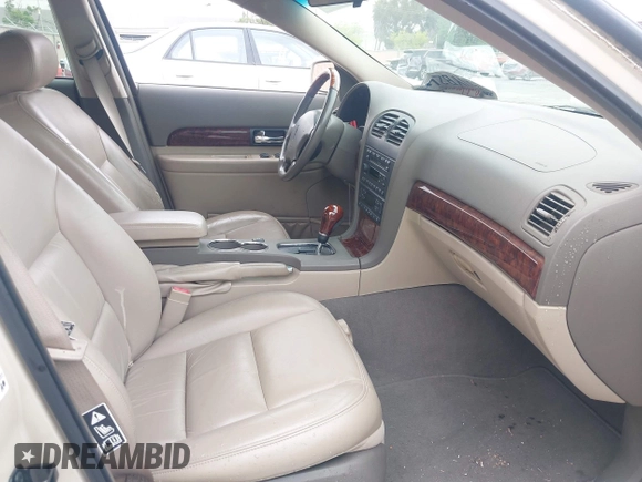 2002 Lincoln LS w/Base Pkg with VIN 1LNHM86S32Y674786, listed as a IAAI auction lot 42056225 with 52,151 mi miles. Bid and sale history available at carsss.com. Image 5.