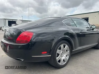 2006 Bentley Continental GT GT with VIN SCBCR63W56C037318, listed as a Copart auction lot 53995755 with 46,990 mi miles and Clean Title. Bid and sale history available at DreamBid. Image 4.