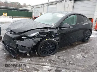 2023 Tesla Model Y Long Range with VIN 7SAYGDEE8PA183301, listed as a IAAI auction lot 41498769 with 82,893 mi miles and . Bid and sale history available at carsss.com. Image 2.