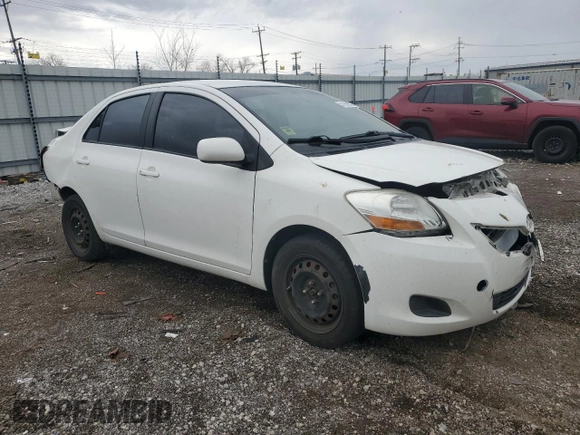 2009 Toyota Yaris with VIN JTDBT903991338082, listed as a Copart auction lot 51156955 with 328,941 mi miles and Salvage Title. Bid and sale history available at carsss.com. Image 4.