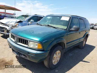 1996 Oldsmobile Bravada z VIN 1GHDT13W5T2711291, wystawiony jako IAAI lot #42502672 z przebiegiem 219 062 mil mil oraz . Historia ofert i sprzedaży dostępna na DreamBid. Obrazek 15.
