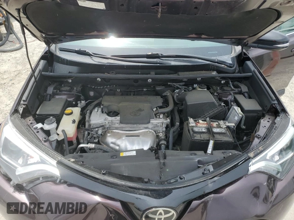 2018 Toyota RAV4 SE with VIN 2T3NFREV8JW444933, listed as a Copart auction lot 55832085 with 75,445 mi miles and Salvage title. Bid and sale history available at DreamBid. Image 12.