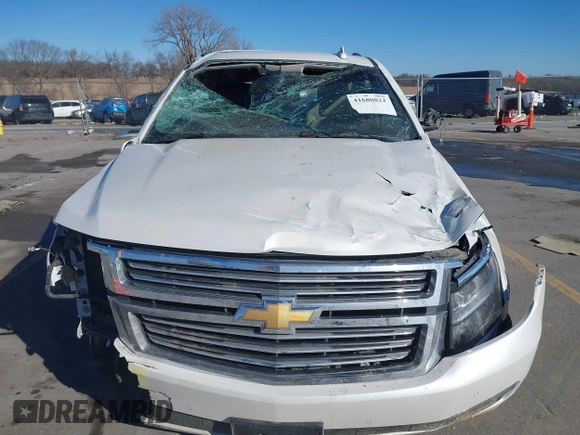 2016 Chevrolet Tahoe LTZ z VIN 1GNSKCKC0GR214110, wystawiony jako IAAI lot #41680822 z przebiegiem 60 271 mil mil oraz . Historia ofert i sprzedaży dostępna na DreamBid. Obrazek 13.