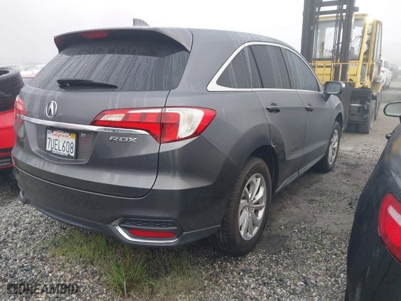 2017 Acura RDX w/Technology Pkg with VIN 5J8TB3H56HL000394, listed as a IAAI auction lot 41548793 with 60,569 mi miles. Bid and sale history available at carsss.com. Image 4.