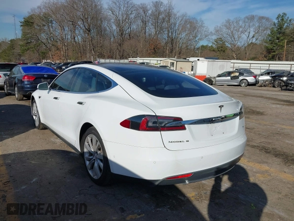 2014 Tesla Model S 60 with VIN 5YJSA1H13EFP62451, listed as a IAAI auction lot 41639068 with 88,000 mi miles and . Bid and sale history available at DreamBid. Image 3.