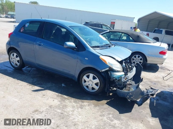 2010 Toyota Yaris with VIN JTDJT4K36A5285298, listed as a IAAI auction lot 42003609 with 158,418 mi miles. Bid and sale history available at carsss.com. Image 1.