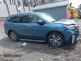 2017 Honda Pilot Touring with VIN 5FNYF6H93HB017623, listed as a IAAI auction lot 41996650 with 97,946 mi miles. Bid and sale history available at carsss.com. Image 13.