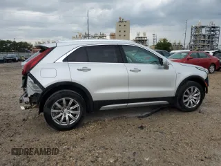 2021 Cadillac XT4 FWD Premium Luxury with VIN 1GYFZCR48MF083164, listed as a Copart auction lot 55377235 with 63,987 mi miles and Salvage title. Bid and sale history available at DreamBid. Image 3.