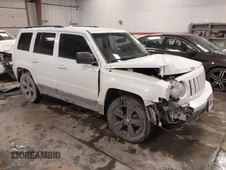 2014 Jeep Patriot Latitude with VIN 1C4NJRFB4ED864114, listed as a IAAI auction lot 41639732 with 103,119 mi miles. Bid and sale history available at carsss.com. Image 1.
