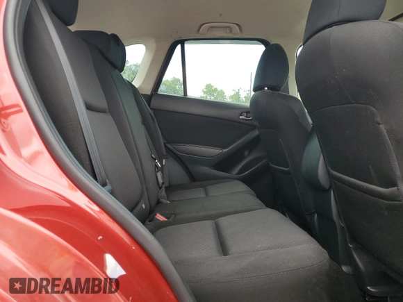 2015 Mazda CX-5 Sport with VIN JM3KE4BY9F0479748, listed as a Copart auction lot 58847805 with 122,698 mi miles and Salvage title. Bid and sale history available at DreamBid. Image 11.
