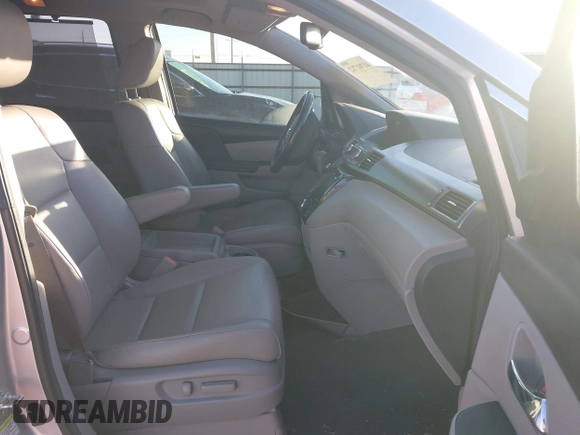 2014 Honda Odyssey Touring with VIN 5FNRL5H97EB094353, listed as a IAAI auction lot 41701712 with 141,228 mi miles and . Bid and sale history available at DreamBid. Image 5.
