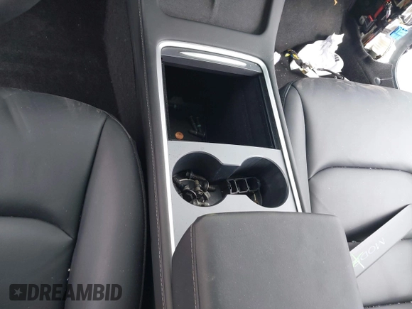 2023 Tesla Model 3 with VIN 5YJ3E1EA4PF410060, listed as a IAAI auction lot 42067624 with 59,934 mi miles and . Bid and sale history available at DreamBid. Image 18.