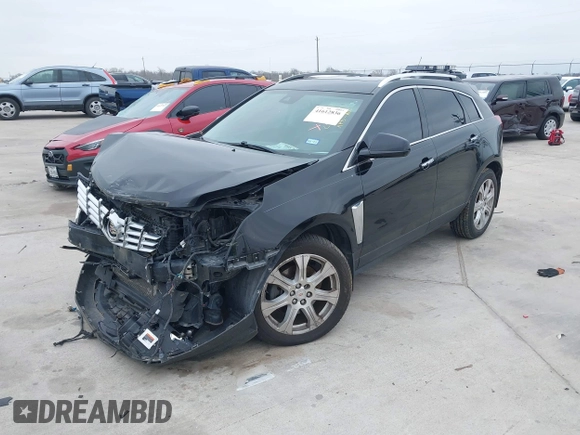 2015 Cadillac SRX Premium Collection z VIN 3GYFNDE3XFS576695, wystawiony jako IAAI lot #41612836 z przebiegiem Nie podano mil oraz . Historia ofert i sprzedaży dostępna na DreamBid. Obrazek 17.