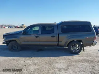 2012 Toyota Tacoma PreRunner with VIN 5TFKU4HN2CX002445, listed as a IAAI auction lot 41400448 with 212,228 mi miles. Bid and sale history available at carsss.com. Image 14.