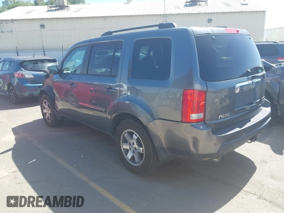 2011 Honda Pilot Touring with VIN 5FNYF4H96BB083532, listed as a IAAI auction lot 41926177 with 100,815 mi miles. Bid and sale history available at carsss.com. Image 3.