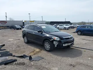 2010 Mazda CX-9 Touring with VIN JM3TB3MV2A0234762, listed as a IAAI auction lot 42069508 with 188,890 mi miles and . Bid and sale history available at DreamBid. Image 1.