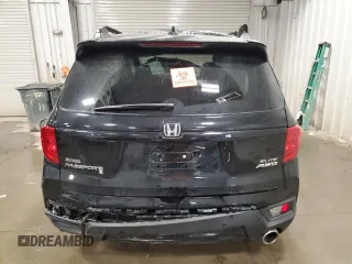 2022 Honda Passport Elite z VIN 5FNYF8H07NB008223, wystawiony jako Copart lot #56065465 z przebiegiem Nie podano mil oraz Nie do naprawy. Historia ofert i sprzedaży dostępna na DreamBid. Obrazek 6.