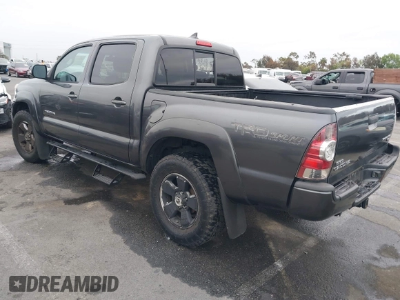 2014 Toyota Tacoma PreRunner with VIN 3TMJU4GN5EM167783, listed as a IAAI auction lot 42031603 with 179,574 mi miles and . Bid and sale history available at DreamBid. Image 3.