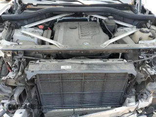 2019 BMW X5 xDrive40i with VIN 5UXCR6C51KLL23163, listed as a Copart auction lot 58598455 with 151,698 mi miles and Salvage title. Bid and sale history available at DreamBid. Image 12.