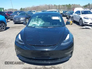 2022 Tesla Model 3 Long Range with VIN 5YJ3E1EB3NF104313, listed as a IAAI auction lot 41832803 with 39,061 mi miles and . Bid and sale history available at DreamBid. Image 12.