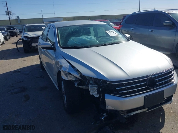 2016 Volkswagen Passat 1.8T S with VIN 1VWAS7A36GC032067, listed as a IAAI auction lot 41207782 with 123,651 mi miles. Bid and sale history available at carsss.com. Image 1.