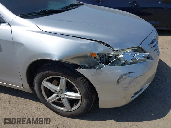 2009 Toyota Camry z VIN 4T1BE46K99U274082, wystawiony jako IAAI lot #42419700 z przebiegiem 124 552 mil mil oraz . Historia ofert i sprzedaży dostępna na DreamBid. Obrazek 6.