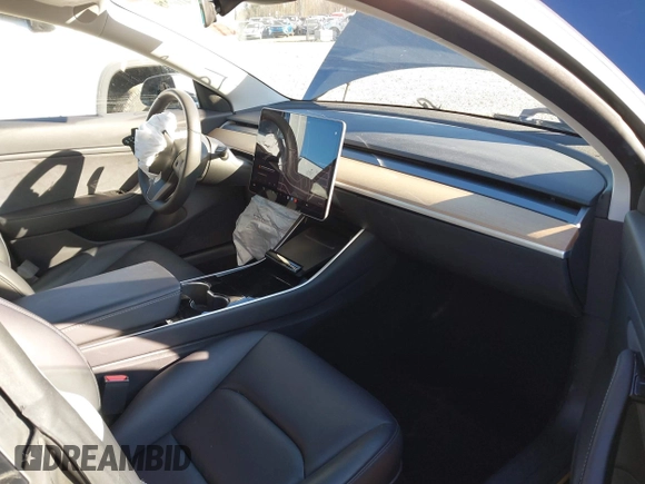 2020 Tesla Model 3 Long Range with VIN 5YJ3E1EB6LF647510, listed as a IAAI auction lot 41692902 with 69,736 mi miles. Bid and sale history available at carsss.com. Image 5.