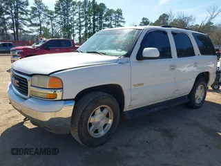 2002 GMC Yukon SLT with VIN 1GKEC13Z02J244875, listed as a IAAI auction lot 41657514 with 329,288 mi miles. Bid and sale history available at carsss.com. Image 2.
