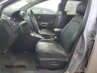 2014 Chevrolet Captiva Sport LT with VIN 3GNAL3EK9ES640609, listed as a Copart auction lot 74691734 with 150,482 mi miles and Salvage Title. Bid and sale history available at DreamBid. Image 7.
