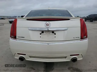 2009 Cadillac CTS RWD z VIN 1G6DU57V690113794, wystawiony jako Copart lot #55104185 z przebiegiem 157 599 mil mil oraz Szkoda całkowita • Salvage title. Historia ofert i sprzedaży dostępna na DreamBid. Obrazek 6.